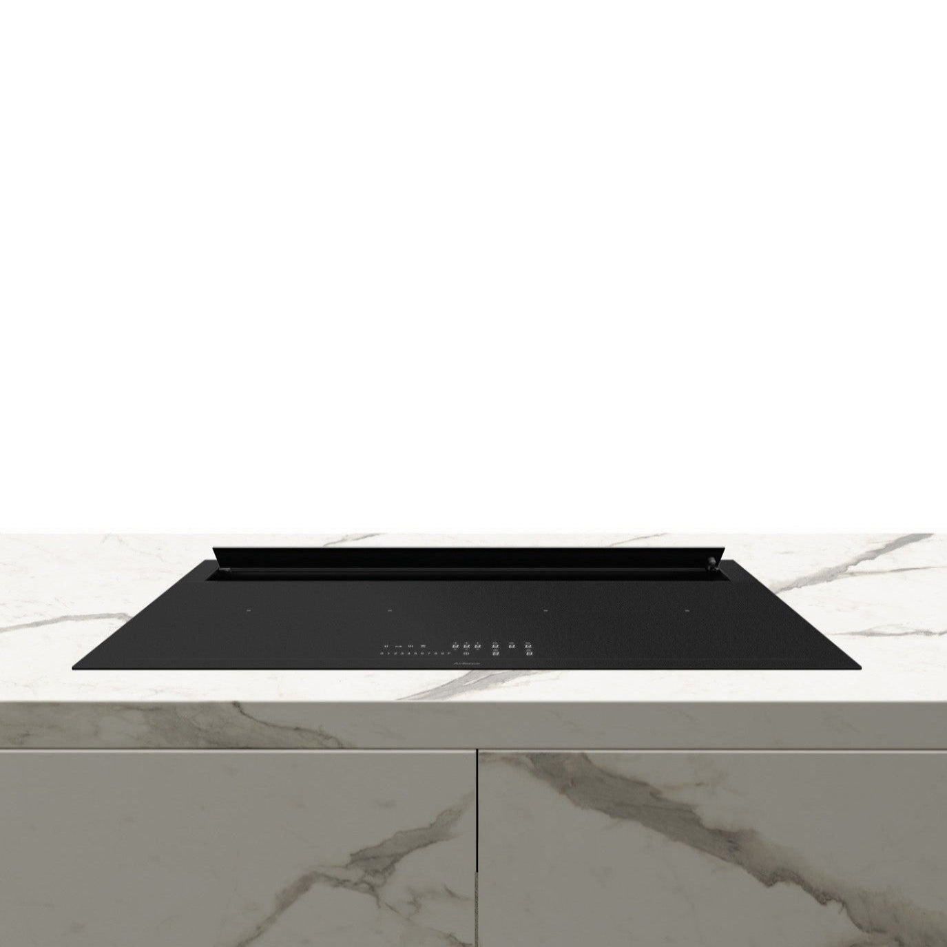 Black induction cooktop on a white marble countertop
